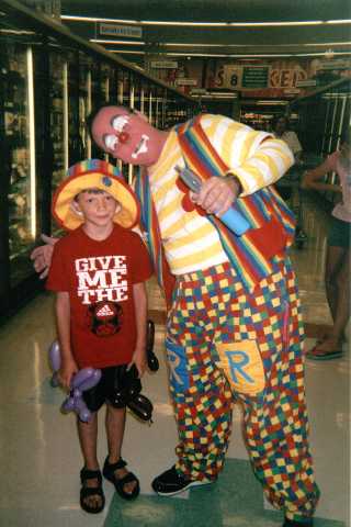 Raynbow the clown and friend inside Trigs