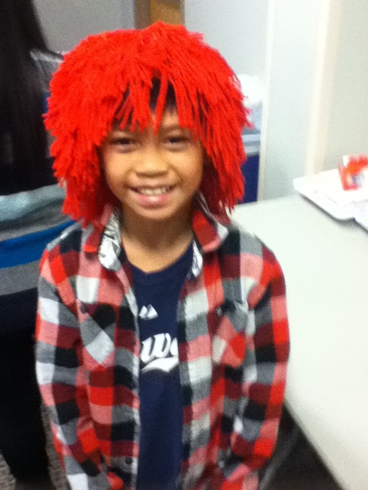 Cedric wearing my clown wig