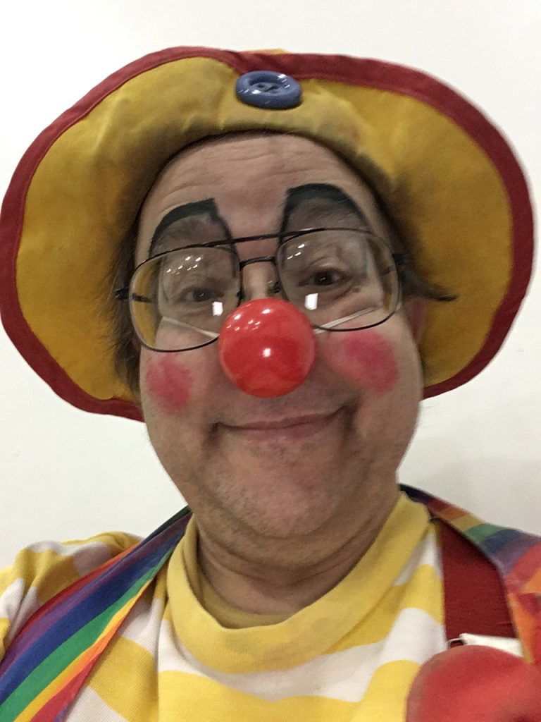 Minimal clown makeup at the New Glarus Bible Church's Grand Prix