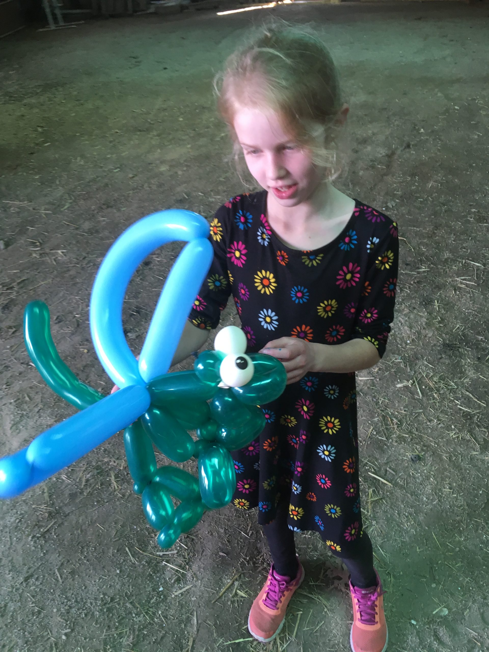 Birthday girl Maddie with a dragon
