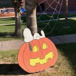 Snoopy resting in front of the spider web at Halloween Safetacular + BOOster Bonanza