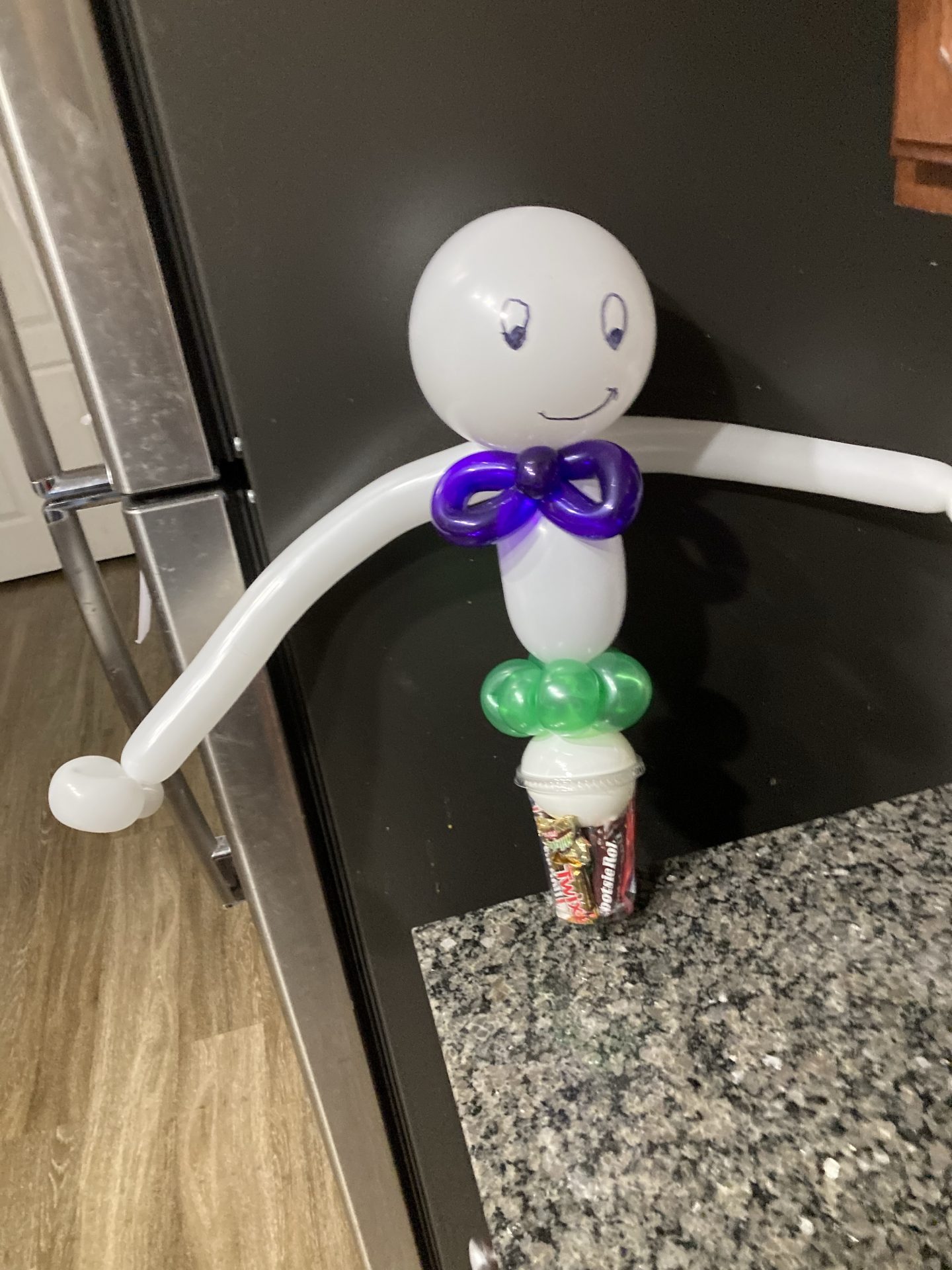Long armed ghost candy cup
