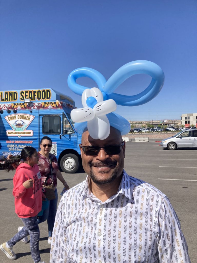 Dad modeling the bunny hat for his 10 year old son