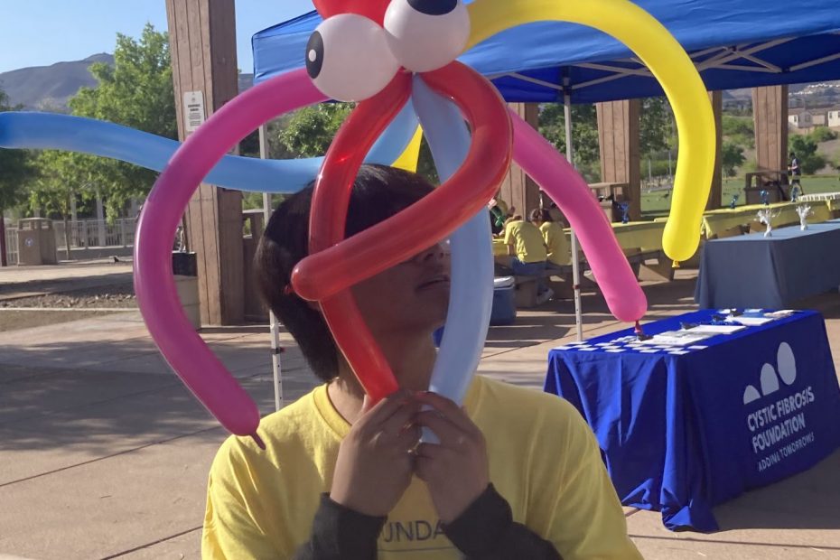 A young man and his balloon octopus