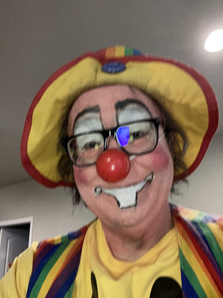 Raynbow the Clown in full face clown makeup